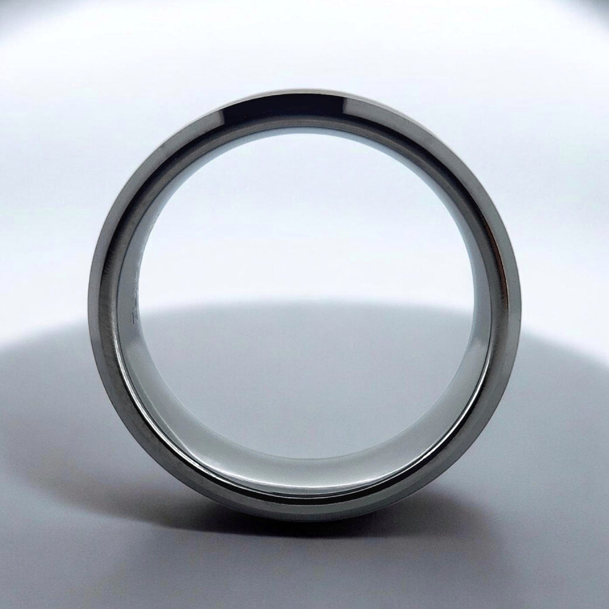 Front view of silver tungsten ring showing beveled profile and band thickness
